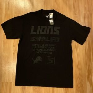 BRAND NEW WITH TAGS LIONS TSHIRT